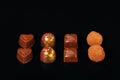 A set of eight chocolate candies Royalty Free Stock Photo