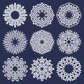Set of eight pointed circular patterns in Oriental intersecting lines style. Nine white mandalas in snowflakes form