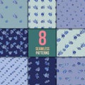 Set of eight seamless patterns with blue flowers Royalty Free Stock Photo