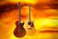 Set of electric and acoustic guitar on a fire background.