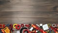 Set of electrician`s tools and accessories on wooden table, flat lay. Space for text Royalty Free Stock Photo