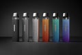 Set of Electronic Vapes in a Variety of Colors standing side by side with a Dark Studio Background.