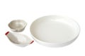 A set of elegant white ceramic bowls and plates with minimal design Royalty Free Stock Photo