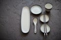 Set of empty ceramic dishes for sushi and rolls on a black stone table Royalty Free Stock Photo