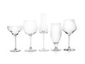 Set of empty glasses for different drinks on white Royalty Free Stock Photo