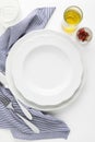 Set of empty plates on a white background