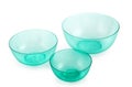 Set empty transparent turquoise plastic bowl isolated