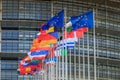 Set of European flags in front of the European Parliament Royalty Free Stock Photo