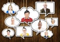 Set of Faces on Hanging Colourful Speech Bubbles Royalty Free Stock Photo