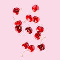 Set of falling ripe cherries. Banner design. Flying fruit as package design element. Royalty Free Stock Photo