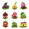 Set of fantasy houses in form of eggplant, pear, cupcake, mushroom, apple, strawberry, watermelon and lemon. Colorful Royalty Free Stock Photo