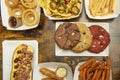 Set of fast food dishes with french fries, sweet potato chips,chocolate Royalty Free Stock Photo