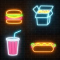 Set of fast food neon signs ona dark brick wall background.
