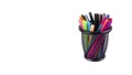 Set of felt-tip pens of different colors in holder isolated