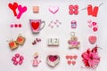 Set of feminine accessories in red and pink colors on white background. Love collection, decorative items, souvenirs. Calendar