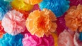 A set of festive party decorations made from colorful recycled tissue paper adding a pop of color to any celebration