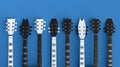 Set of fingerboard of electric acoustic guitar isolated on blue background. Royalty Free Stock Photo
