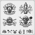 Set of firefighter emblems, labels and design elements. Royalty Free Stock Photo