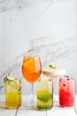 Set of five cocktail on light background. many fresh cocktails or lemonade. Different delicious cocktails on light tile table in