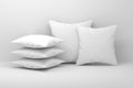 Set of five white blank pillows with blank surfaces