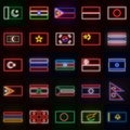 A set of 25 flags of different Asian countries, in neon style. On the background of a brick wall with a shadow.