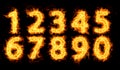 Set of flaming numbers on black background Royalty Free Stock Photo