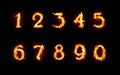 Set of flaming numbers on black background Royalty Free Stock Photo