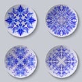 Set of floral circular plates