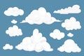 Set fluffy clouds simple cute design in cartoon style isolated on blue background. Collection weather soft object Royalty Free Stock Photo