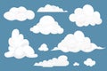 Set fluffy clouds simple cute design in cartoon style isolated on blue background. Collection weather soft object Royalty Free Stock Photo