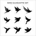 Set of flying birds sign logo vector silhouettes isolated on white Royalty Free Stock Photo