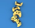 Set of flying gamer joysticks or gamepads on blue background