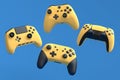 Set of flying gamer joysticks or gamepads on blue background