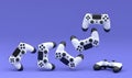 Set of flying gamer joysticks or gamepads on violet background