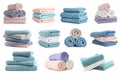Set of folded and rolled colorful towels on white background Royalty Free Stock Photo