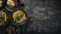 A set of food and dishes. Pasta, rice, risotto, salad.