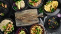 A set of food and dishes. Pasta, rice, risotto, salad.