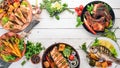 A set of food. Steak, Fish, Vegetables and Spices. On a wooden background. Royalty Free Stock Photo