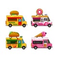 A set of food trucks on a white isolated background. Burger, ice cream, doughnut, taco. Royalty Free Stock Photo