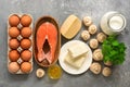 Set of foods rich in vitamin D on a gray background. The concept of healthy diet food. Top view, flat lay