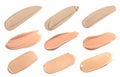 Set of foundation samples in different tones on white background Royalty Free Stock Photo