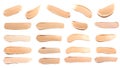 Set of foundation samples in different tones on white background Royalty Free Stock Photo