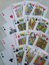 Set of four aces, kings, queens and jacks from a deck of playing cards. Organized over white background. Royalty Free Stock Photo
