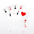 Set of four aces playing cards suits. Winning poker hand. Set of hearts, spades, clubs and diamonds ace with reflection Royalty Free Stock Photo