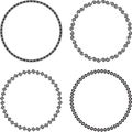 Set of four ascetic round frames on a black background