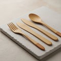 Items including a fork two knives and a spoon is neatly arranged on Royalty Free Stock Photo