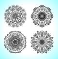 Set with four beautiful Mandalas. Vector ornaments, round decorative elements for your design Royalty Free Stock Photo