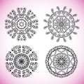 Set with four beautiful Mandalas. Vector ornaments, round decorative elements for your design Royalty Free Stock Photo