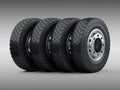 Set of four big vehicle truck tires stacked. New car wheels with