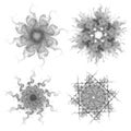 Set of four black snowflakes on a white background. Abstract computer generated fractal image of a snowflake Royalty Free Stock Photo